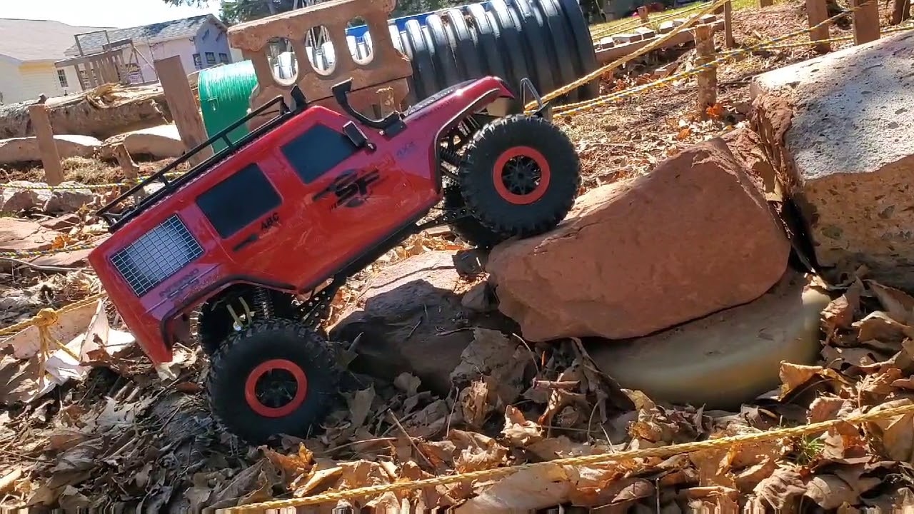 RC auto Jeep WL Toys 104311 + náhradní baterie