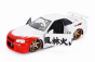 Jada Nissan Skyline Gt-r (r34) Advan 2002 With Street Fighter Ryu Figure 1:24 Bílá Červená