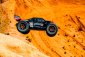 RC auto PUNISHER-4 Monster Truck 4WD 3-4S RTR, červená