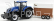 Bburago New holland T7000 Tractor With Horse Trailer - Trasporto Cavalli 1:32 Modrá Hnědá Bílá