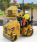 Dm-models Caterpillar Catcb2.7 Silniční válec 1:50, žlutá
