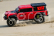 RC auto PATHFINDER 1/10 sada 2,4GHz, červená