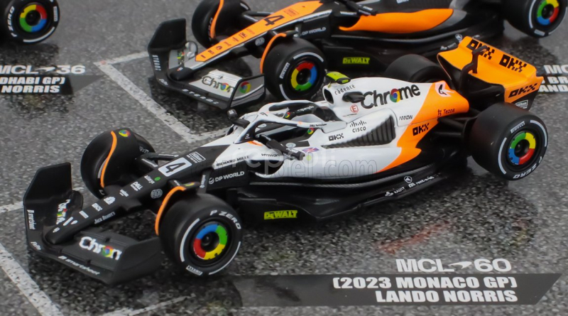 Bburago Mclaren F1  Set 4x - Team Mclaren Mcl36 N 4 Abu Dhabi Gp 2022 - Mcl60 N 4 Singapore Gp - Monaco Gp - British Gp 2023 Lando Norris 1:43 Oranžová Černá Bílá