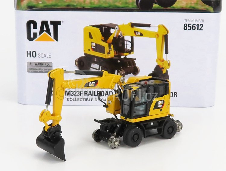 Dm-models Caterpillar Catm323f Kolový bagr na železnici 1:87, žlutá