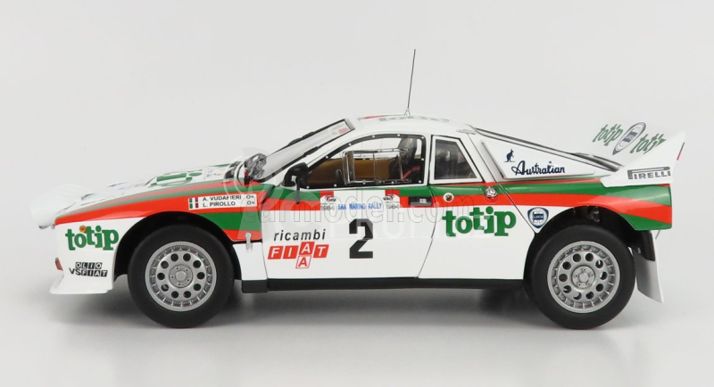 Kyosho Lancia 037 Totip Rally San Marino 1984 A.Vudafieri - L.Pirollo 1:18, bílá