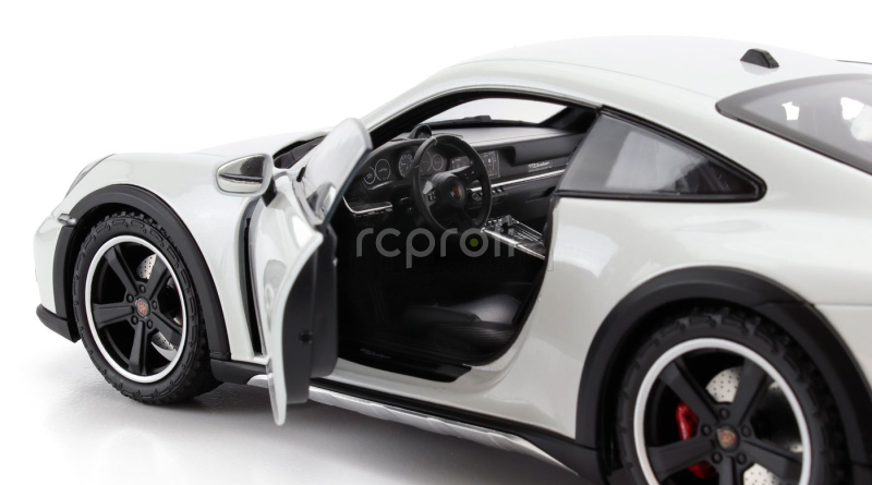 Minichamps Porsche 911 992 Dakar Coupe 2022 1:18 Světle Šedá