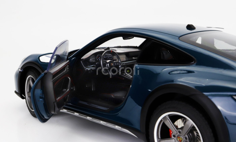 Norev Porsche 911 992 Dakar Coupe 2023 1:18 Fjord Modrá Zelená