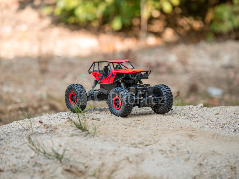 RC auto RMT Rock Buster, červená + náhradní baterie