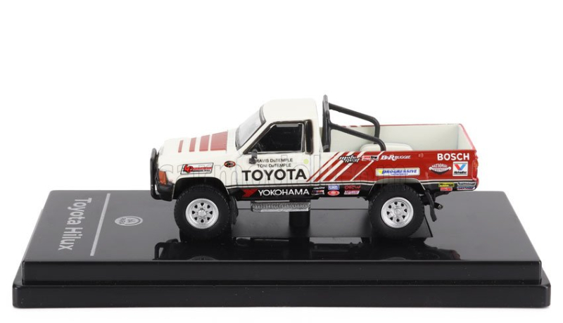 Paragon-models Toyota Hilux Pick-up Racing 1985 1:64 Bílá Červená