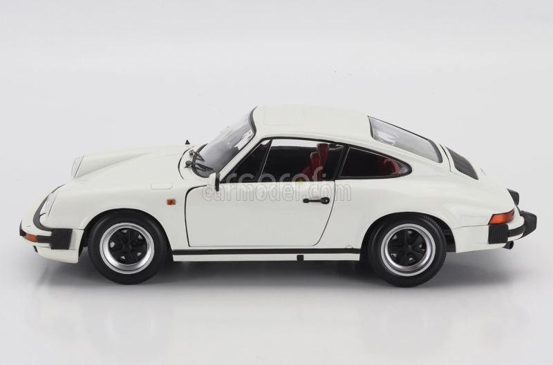 Minichamps Porsche 911 3.2 Carrera Coupe 1983 1:18 Bílá