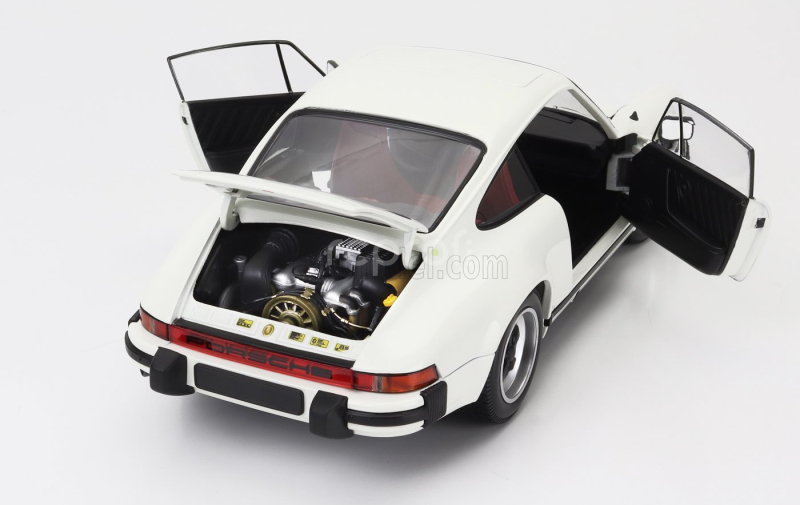 Minichamps Porsche 911 3.2 Carrera Coupe 1983 1:18 Bílá