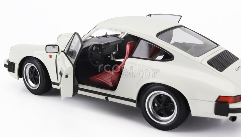 Minichamps Porsche 911 3.2 Carrera Coupe 1983 1:18 Bílá